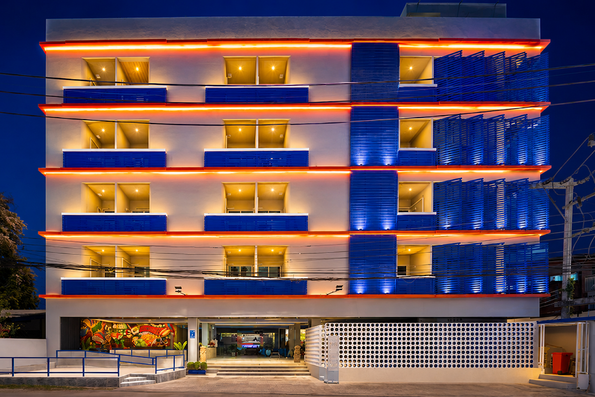 AKIRA Hotel at night, blue LED facade